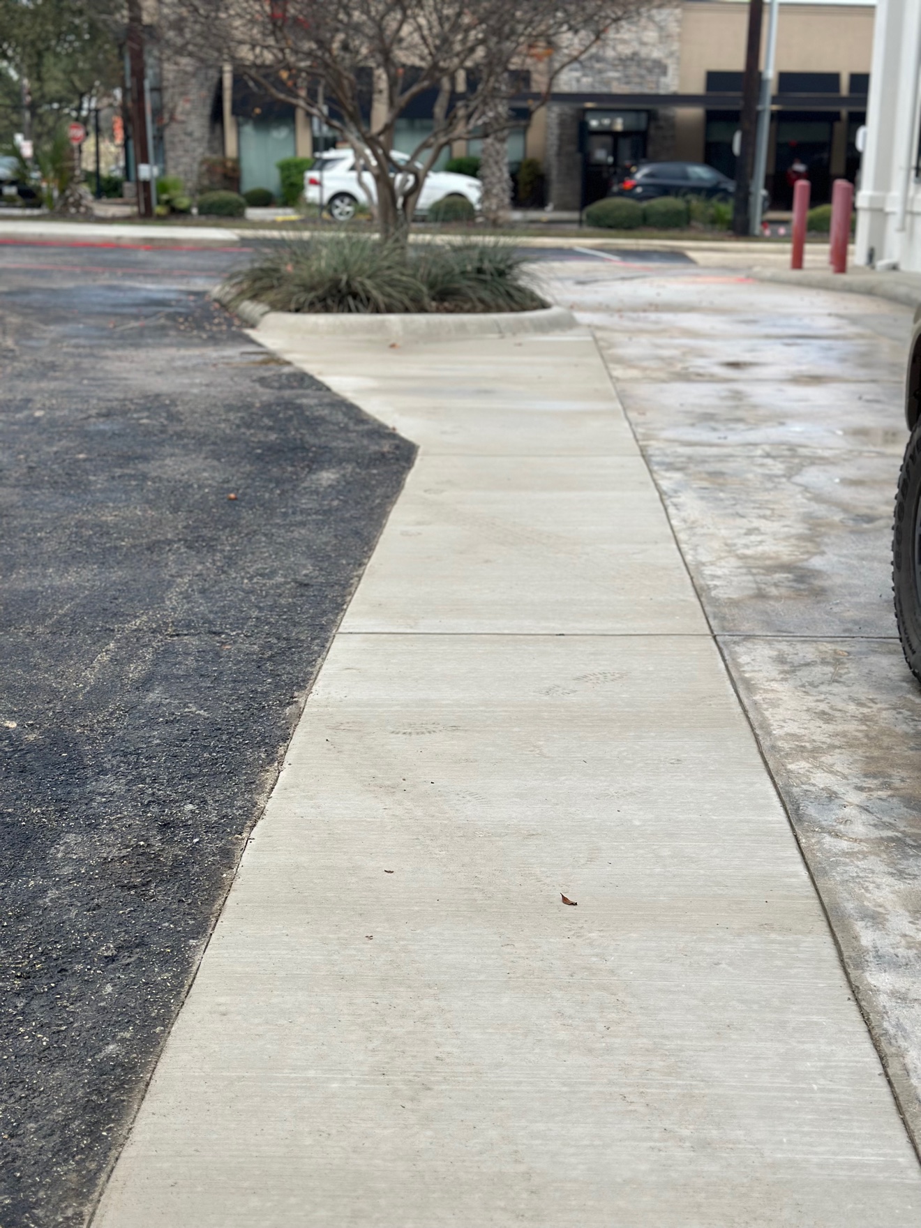 Finished concrete sidewalk on RaM'S Concrete's first job