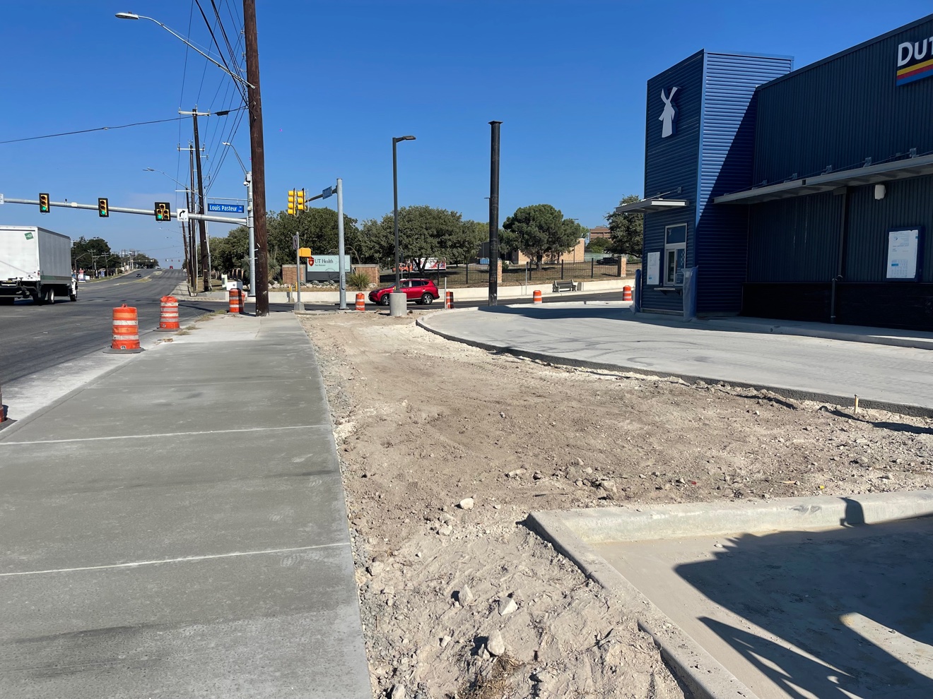 Fresh concrete sidewalk and drive-thru at the Dutch Bros in San Antonio