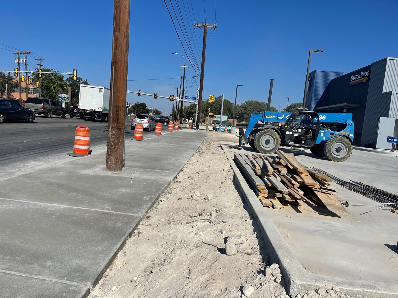Concrete driveway and sidewalk at the Dutch Bros in San Antonio