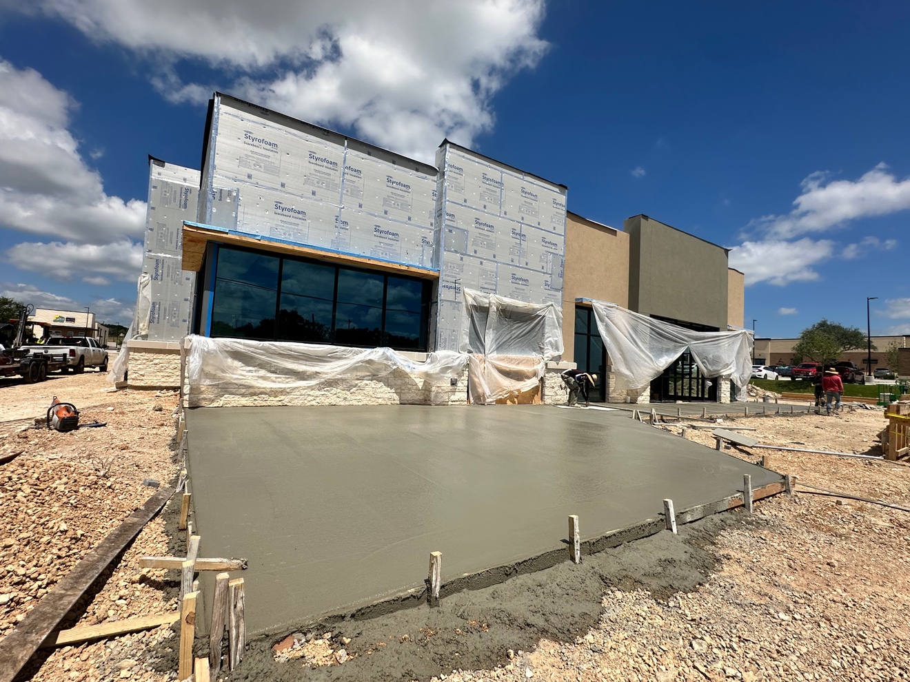 Freshly poured entrance slab in front of Panera Bread